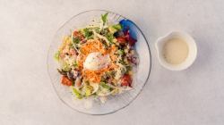 Caesar salad with warm bean egg