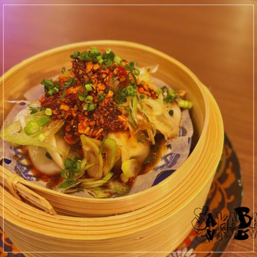 Boiled dumplings with lots of green onions