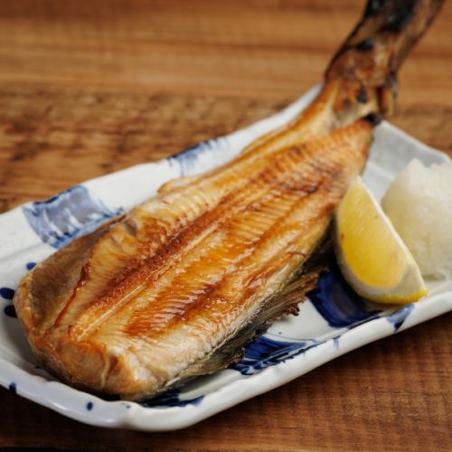 Half a grilled Atka mackerel