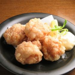 Deep fried chicken thighs with your choice of sauce!