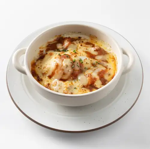 温泉卵と牛すじカレーのリゾットドリア