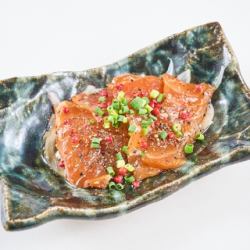 Fatty salmon marinated in black pepper