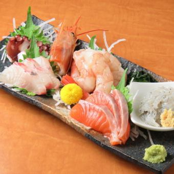Assorted sashimi seafood is served in season, changing daily and weekly.