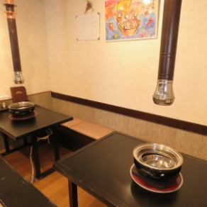 2~4名様のBOX席と、4~8名様のBOX席を結合して10~12名収容可能