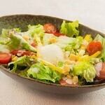 Caesar salad topped with soft, soft-boiled egg (cheese Caesar dressing)