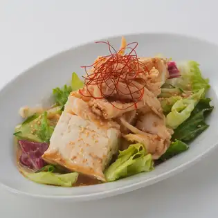 Steamed chicken and tofu salad with fragrant sesame sauce
