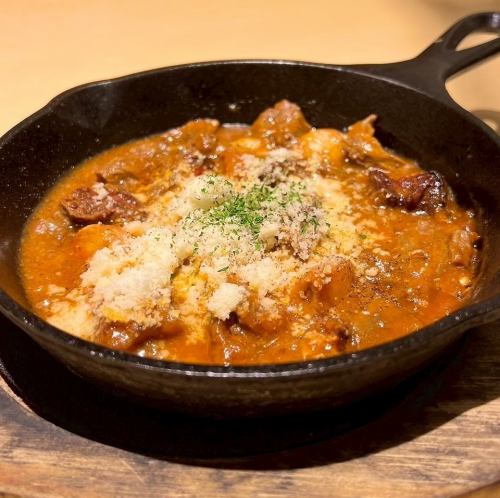 Beef tendon stewed in tomato sauce