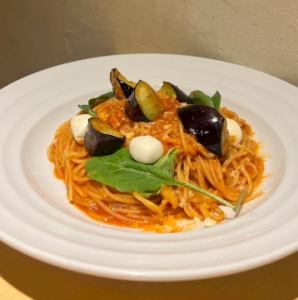 Mozzarella cheese and fried eggplant in ripe tomato sauce