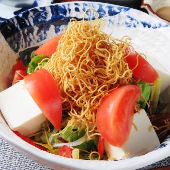 Crispy salad of tofu and fried noodles