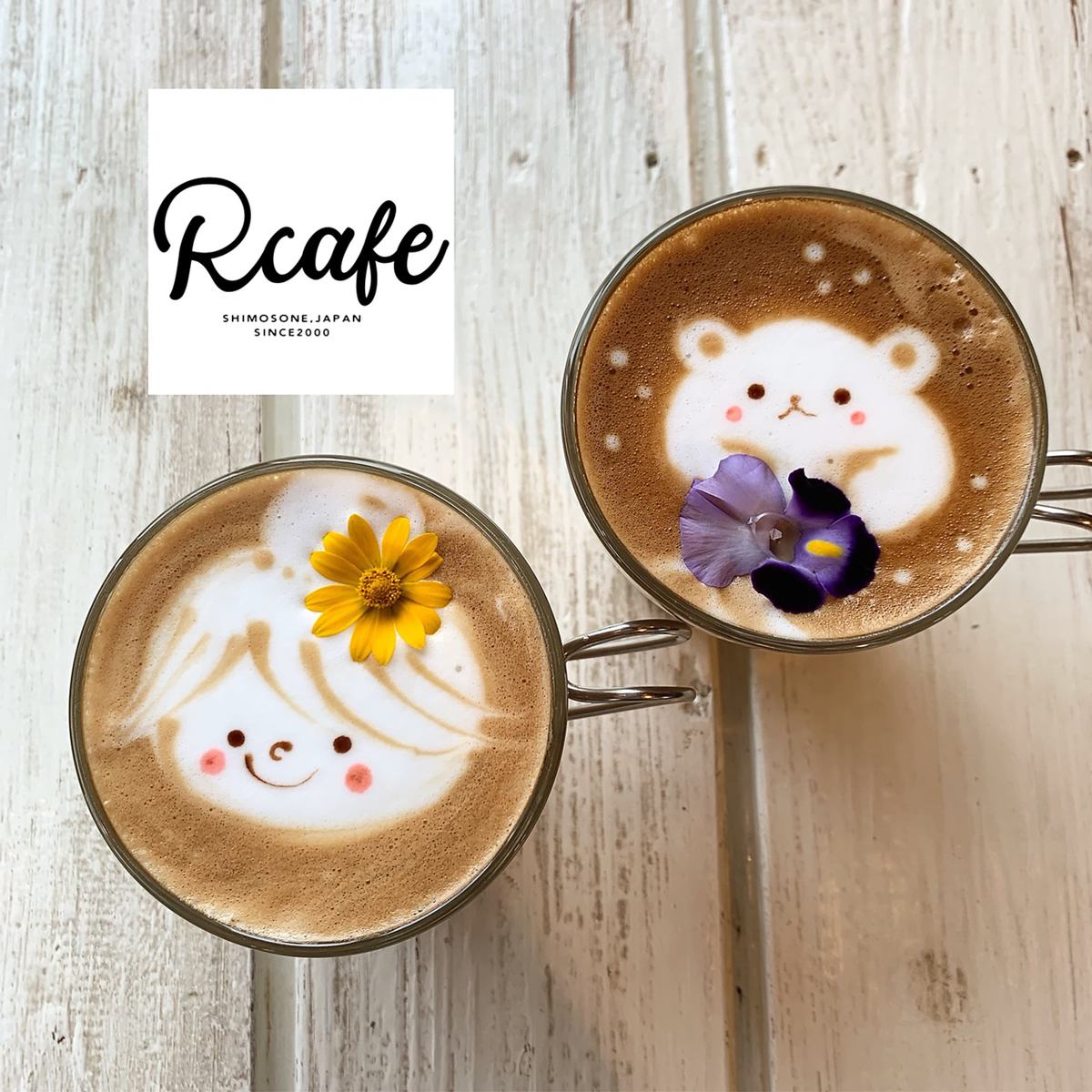 A cute menu with latte art and edible flowers