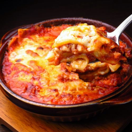 Homemade pasta lasagna with plenty of volume, everything from the seasonings is handmade