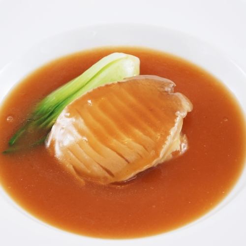 Premium abalone simmered in oyster sauce with vegetables