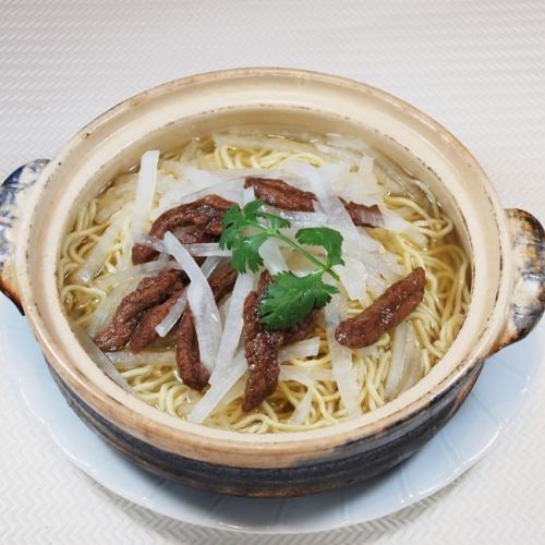 Beef and thinly sliced radish stewed in a clay pot