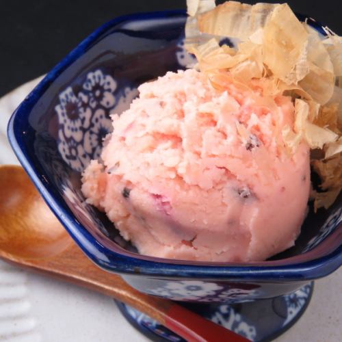 Red potato salad made by the proprietress