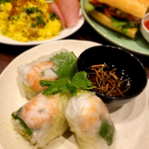 Shrimp and pork spring rolls.With peanut miso sauce