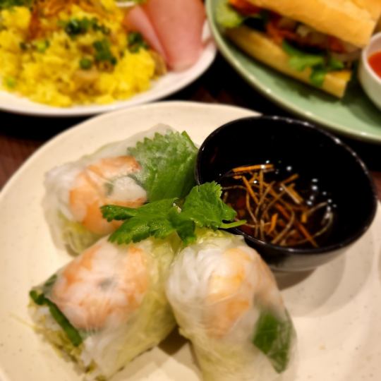 Shrimp and pork spring rolls.With peanut miso sauce