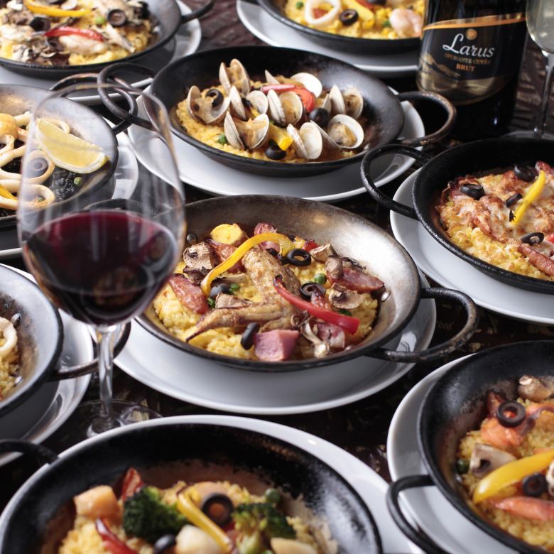 [Specialty: Paella] is our signature dish! Enjoy the authentic taste of Spain with its rich seafood stock!