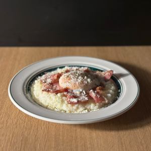 Cream risotto with crispy bacon and soft-boiled egg