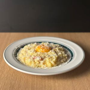 Carbonara risotto with rich cream and plump eggs