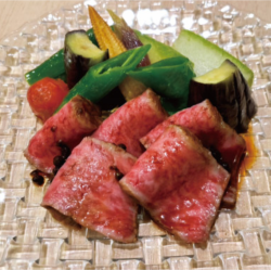 Roast Matsusaka beef and summer vegetables with Japanese pepper sauce