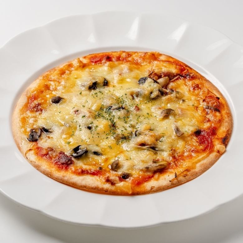 コーンビーフときのこのピザ