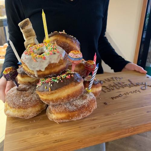 A birthday donut stacked with popular donuts from "BURROW", which opened inside the BURTON store★