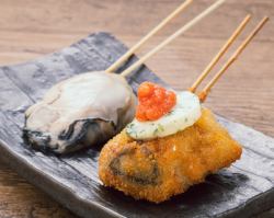 Large oysters, garlic butter and mentaiko