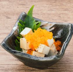 Pickled cream cheese topped with flying fish roe