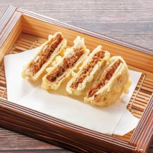 Deep-fried lotus root sandwiched in duck miso sauce