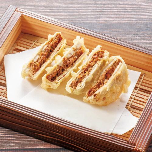Deep-fried lotus root sandwiched in duck miso sauce