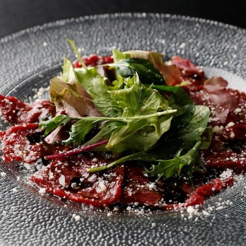 Horse meat carpaccio with balsamic sauce