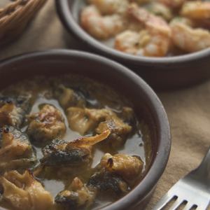 Grilled whelk with garlic butter