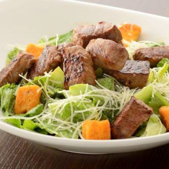 Dice cut steak caesar salad