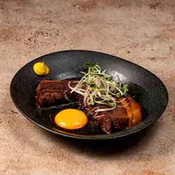 Tender braised pork belly