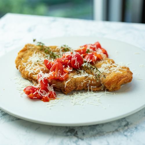 Paprika and fresh tomato schnitzel / Schnitzel Parmigiana