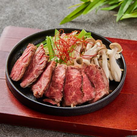 Beef skirt steak grilled on an iron plate ~ Japanese style grated daikon radish ~
