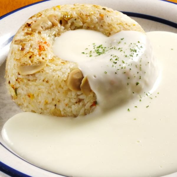 "White pilaf" topped with thick white sauce