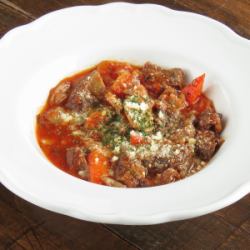 Stewed beef tendon in tomato