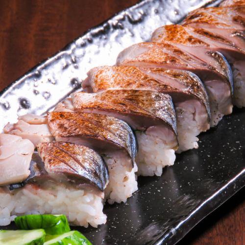 Finished with crispy grilled mackerel sushi