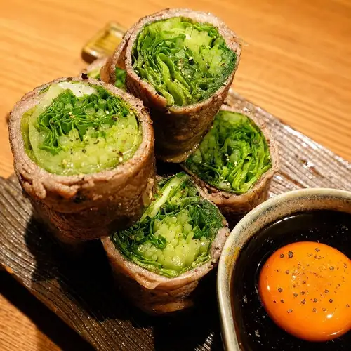 Meat rolls with Kyoto mizuna and lettuce ~with special egg sauce~
