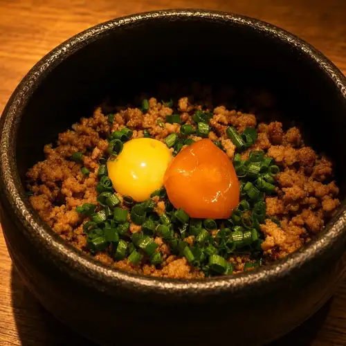 A sweet and savory minced meat hot pot featuring egg yolks.