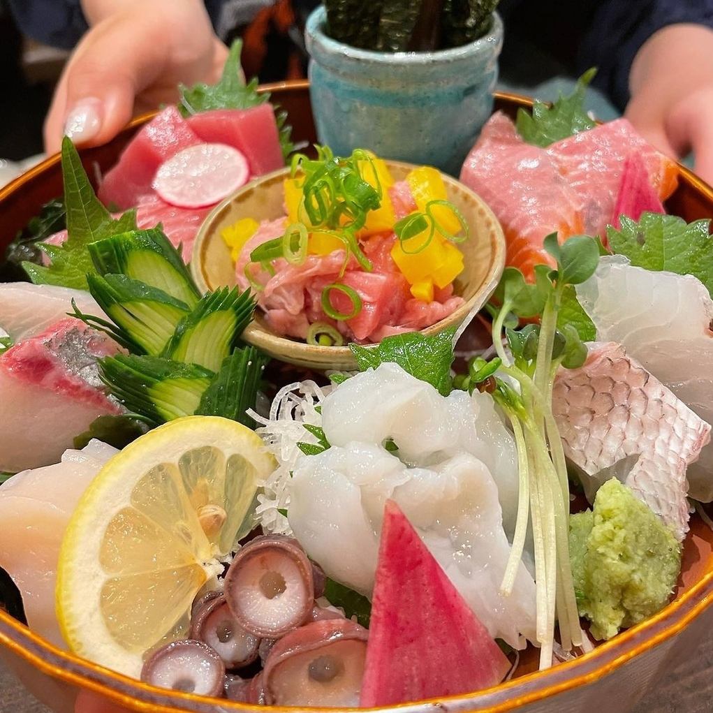 Assorted fresh fish sashimi and robatayaki directly from Ishinomaki.Miyagi's delicious food.
