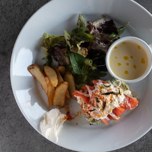 Homemade salmon and avocado open sandwich plate
