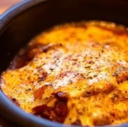 豚出汁でじっくり煮込んだ石焼チーズカレー