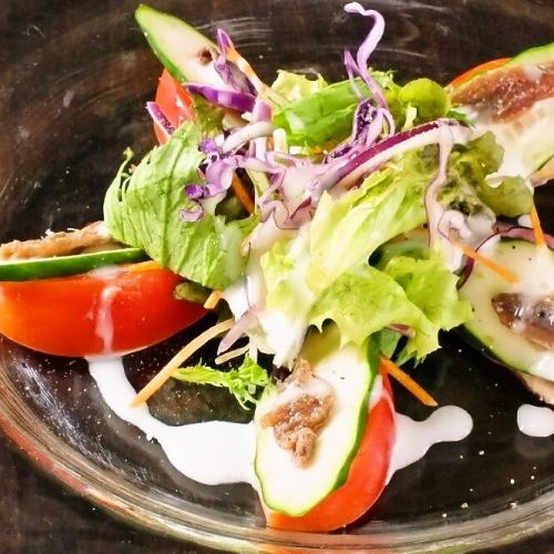 Anchovy salad with tomato and cucumber