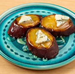 Baked Annou sweet potato with blue cheese and honey