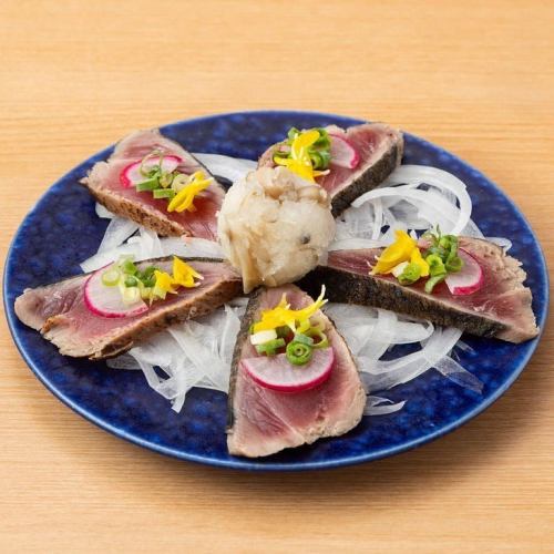 Seared bonito with grated radish and plum ponzu sauce