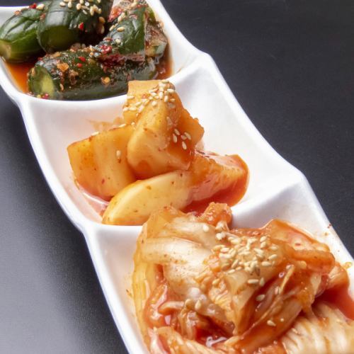 Three kinds of kimchi served