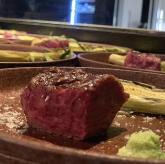 A luxurious course of 7 dishes including the legendary Ozaki beef, raw yukhoe, and wood-grilled steak