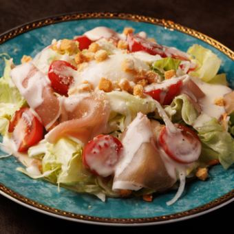 Caesar salad with soft-boiled egg and prosciutto